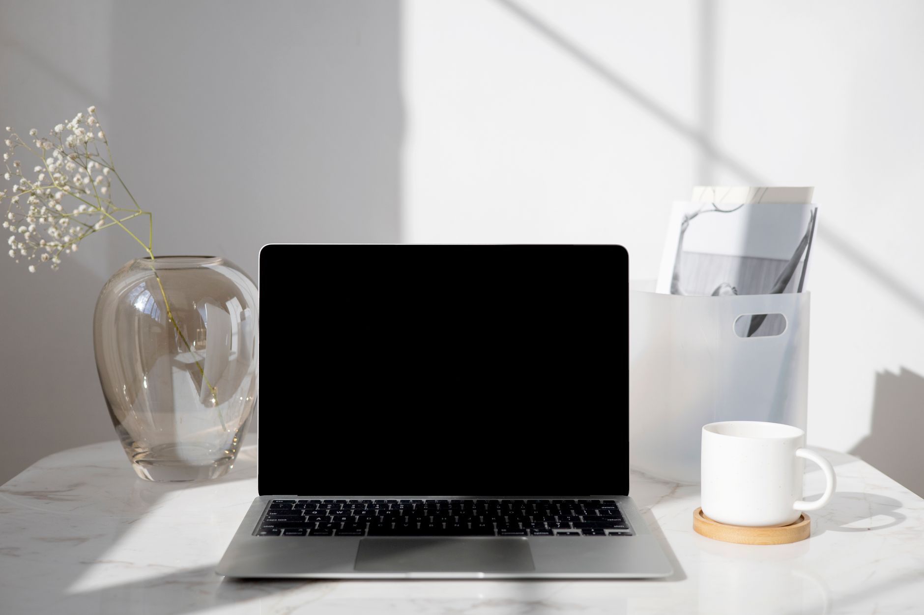 a life coach using Notion AI dashboard to organize client plans and progress notes on a laptop