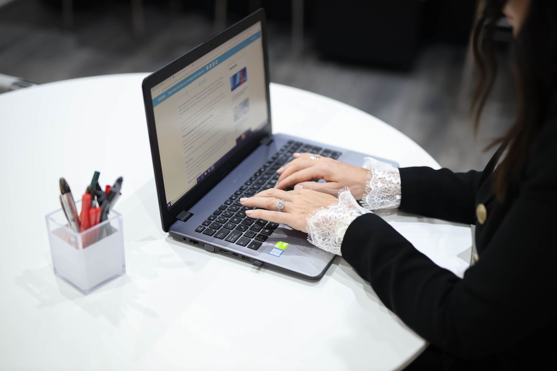 a person reviewing an SEO content score on a laptop screen at a desk