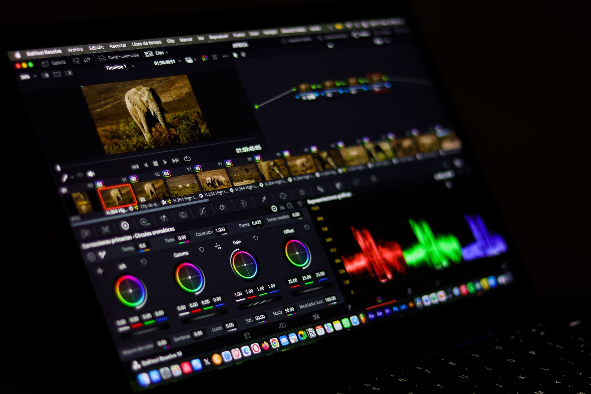 a video editor trimming clips using a text transcript on a laptop screen