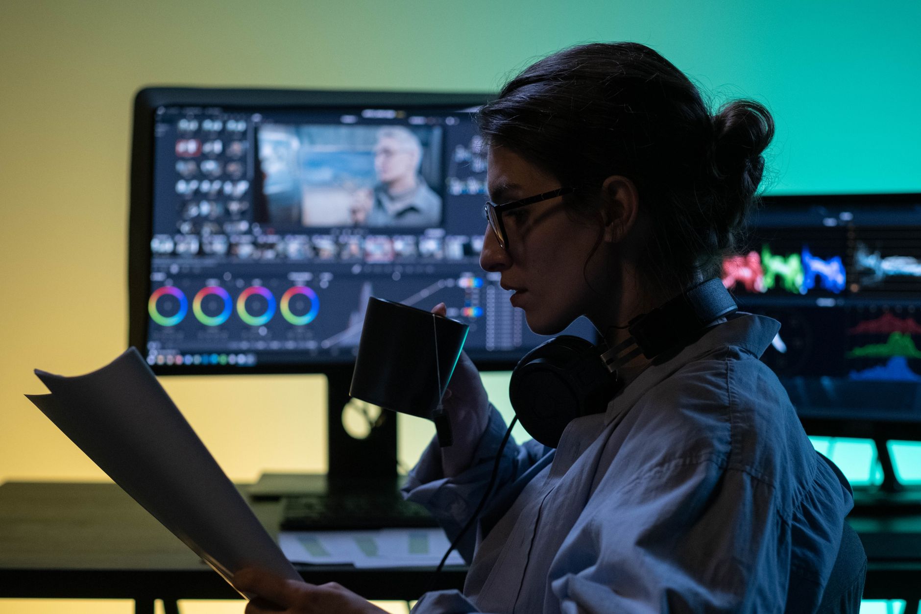 Person using a visual automation builder with colorful connected nodes on a screen